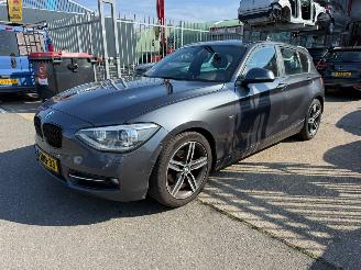 skadebil auto BMW 1-serie 116D EDE HIGH EXECUTIVE 2014/1