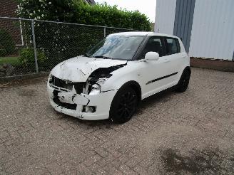 Auto incidentate Suzuki Swift 1.3 Airco 5-Drs Parelmoer wit 2009/1